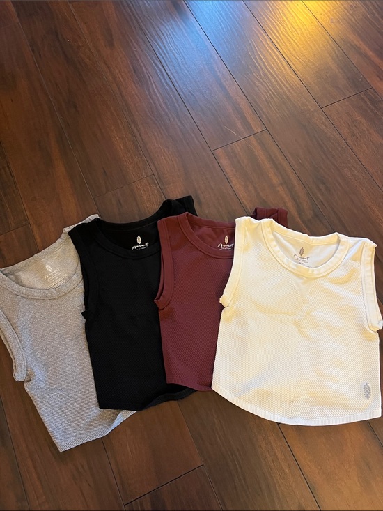 FP Movement by Free People Tops - Free People lot of four FP Movement stretch, tank tops size M, new condition